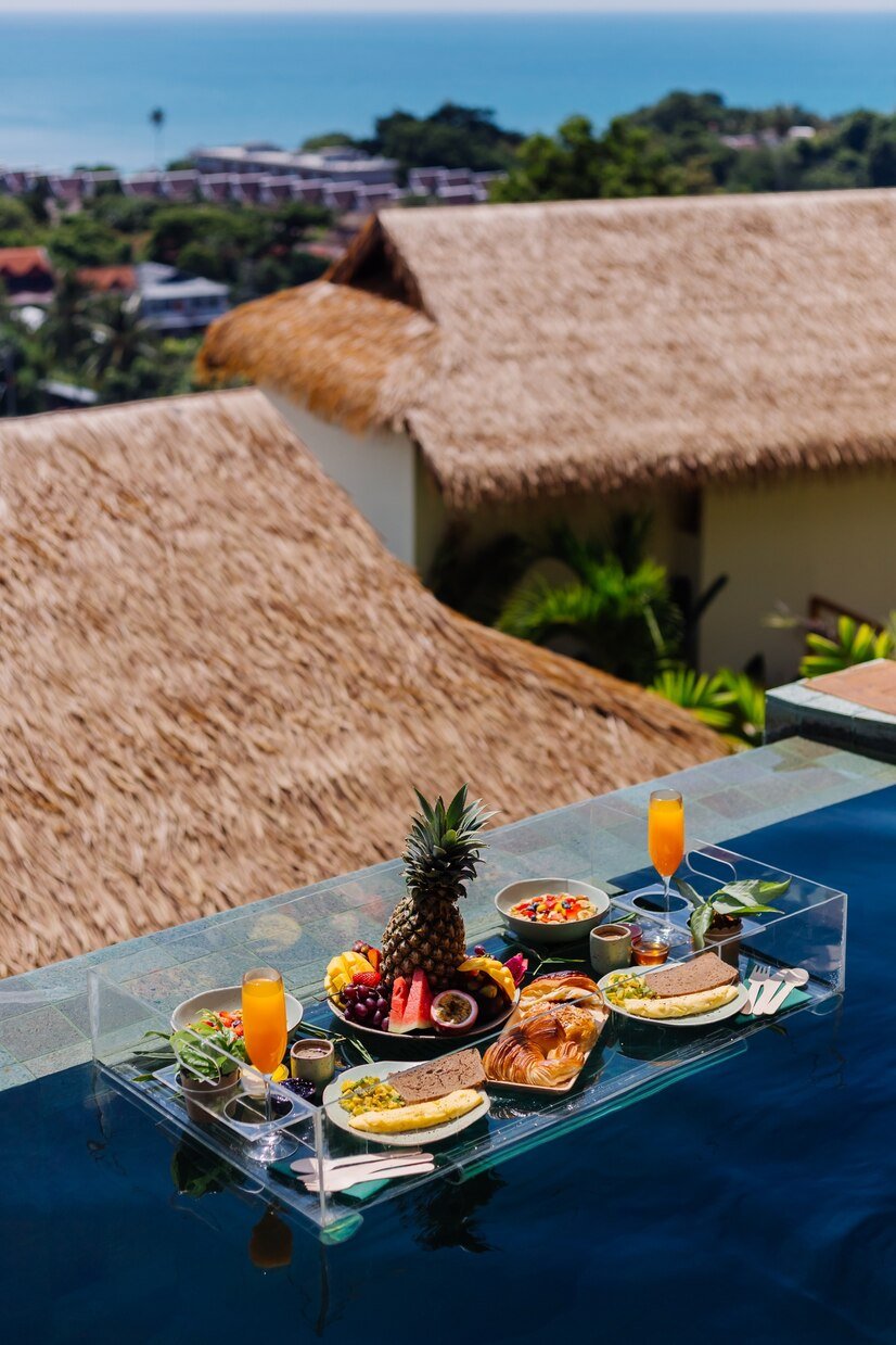 floating-breakfast-amazing-hotel-villa-blue-swimming-pool_343596-1144