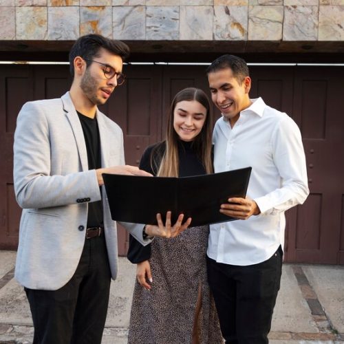 front-view-couple-talking-real-estate-agent_23-2150322109