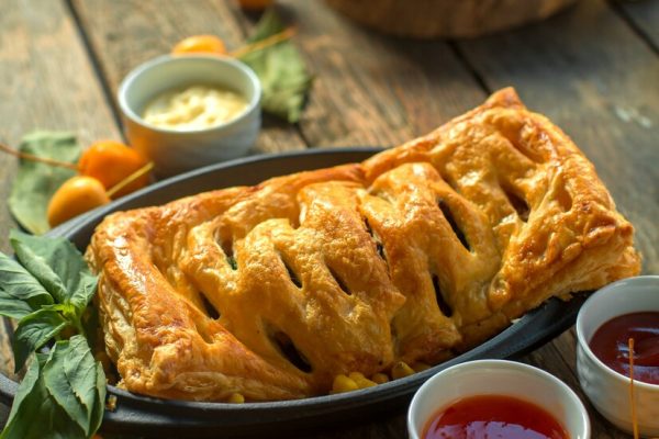 front-view-meat-pie-with-sauces-medlar_140725-13870