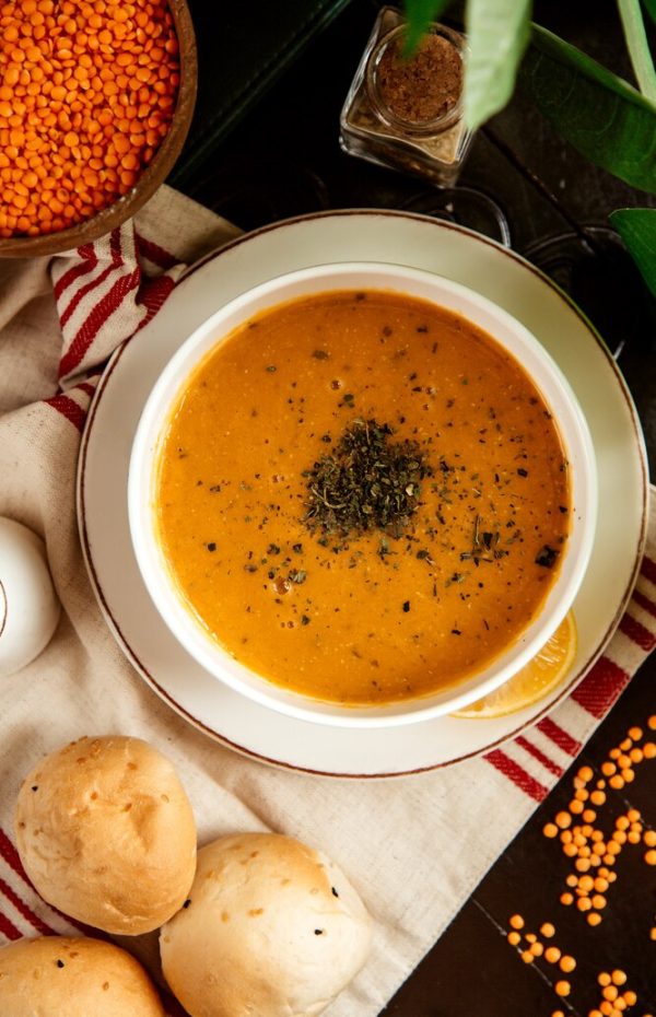 top-view-lentil-soup-traditional-azerbaijani-soup-with-lemon-dry-mint_140725-11544