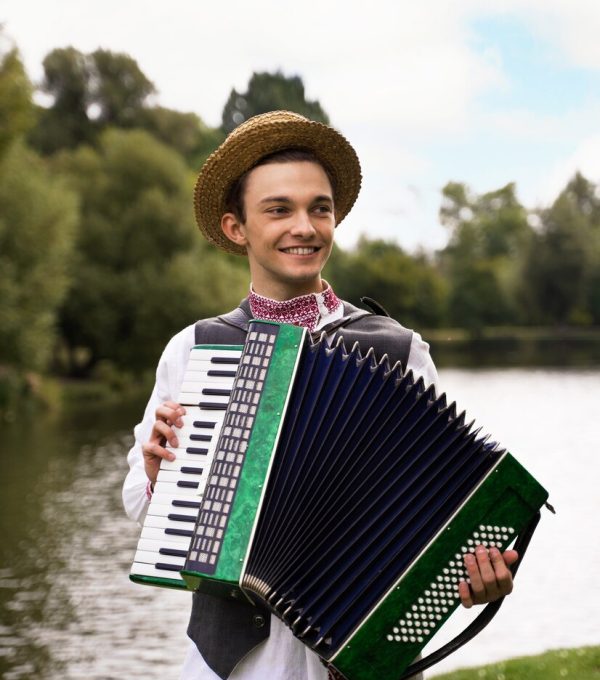 young-adults-having-fun-while-folk-dancing_23-2149849703